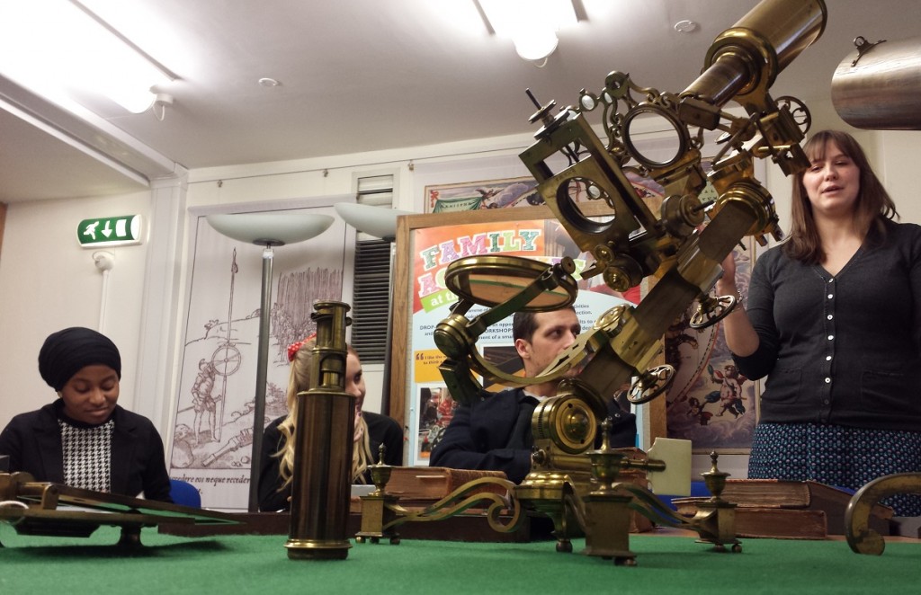 Sophie is seen demonstrating history with the Grand Universal microscope (inv. 53159)
