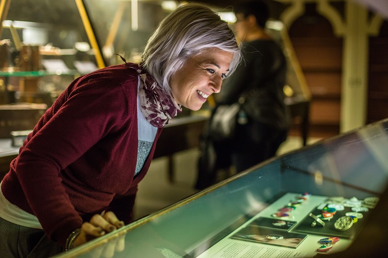 Visitor looking at display